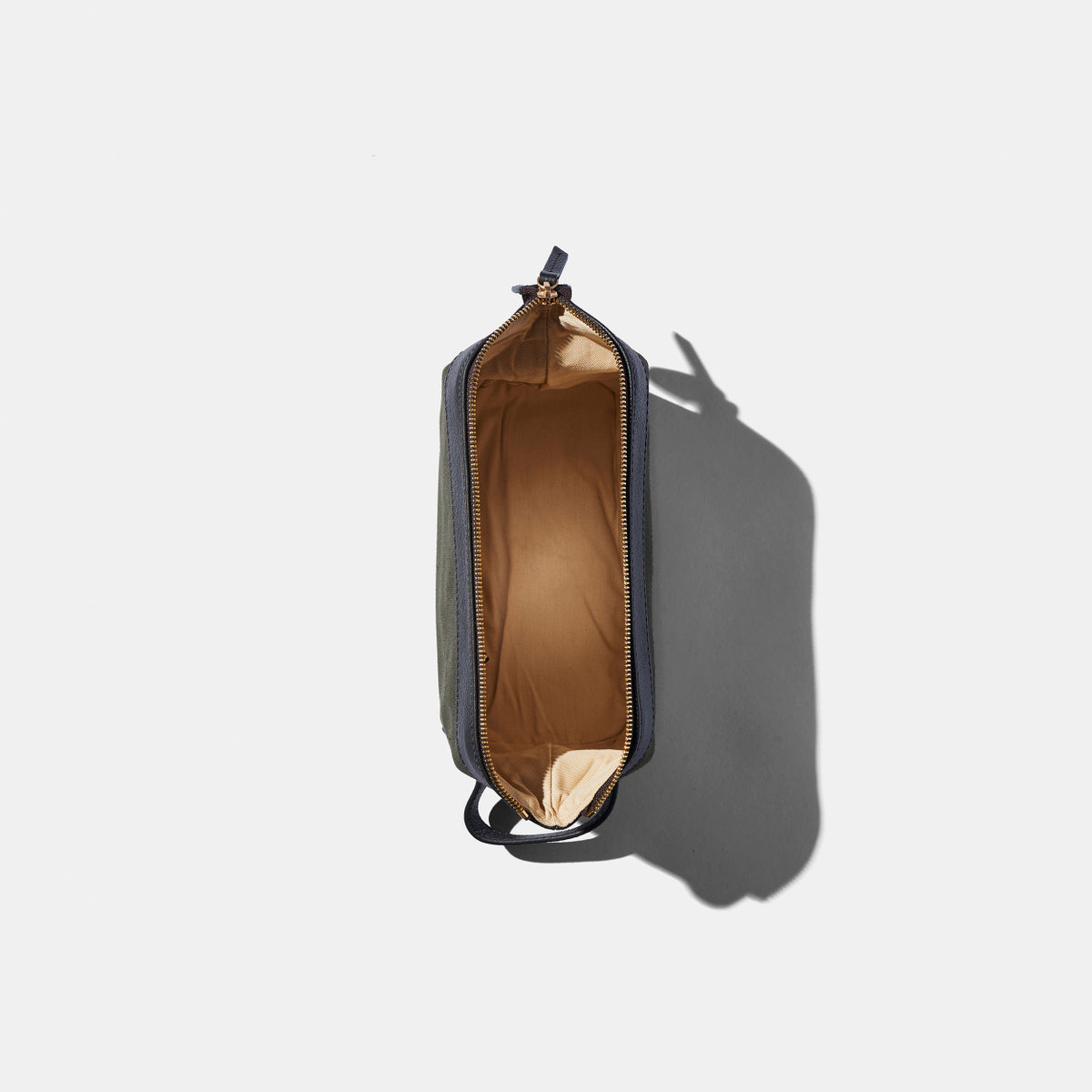 
                  
                    Wash Bag in Green Canvas
                  
                