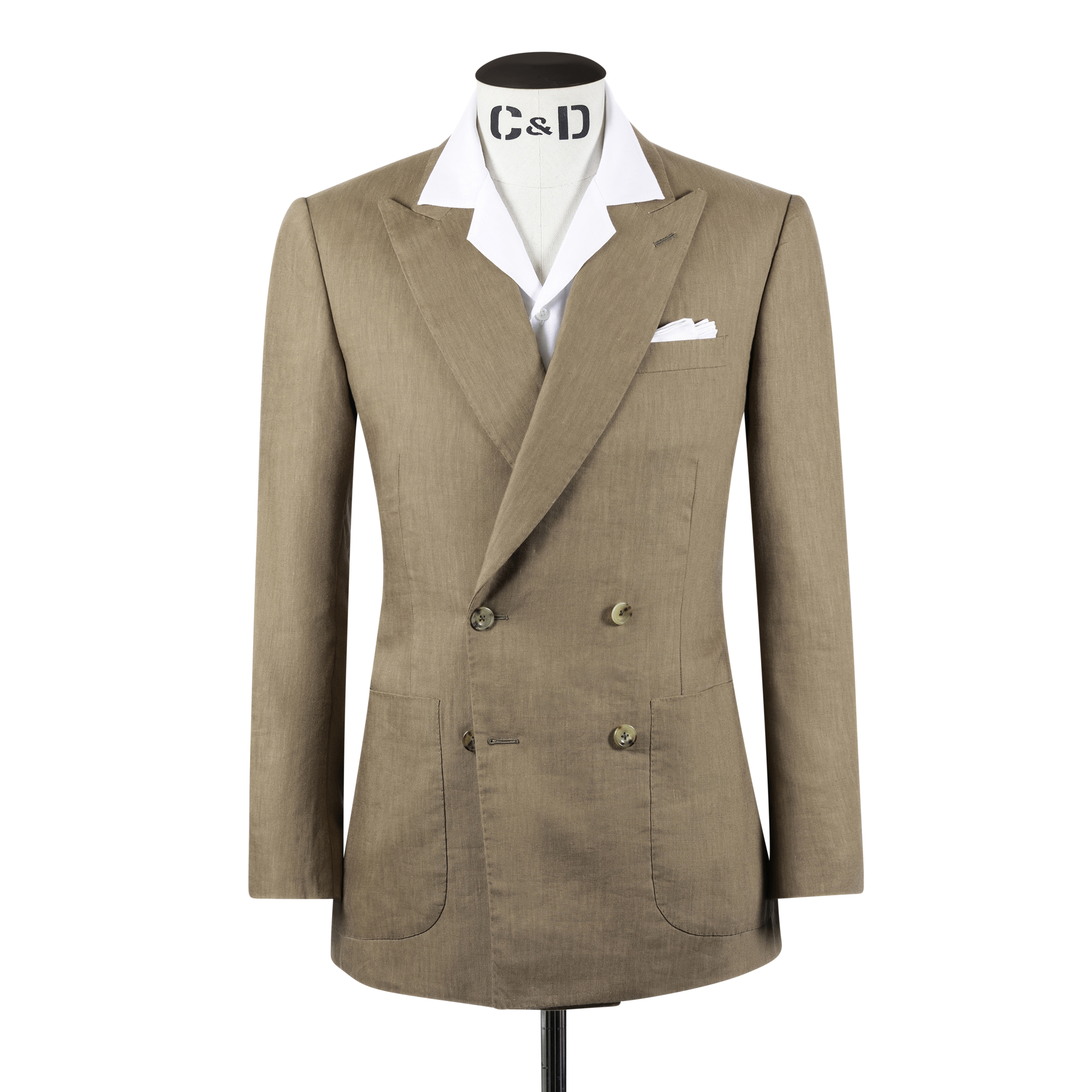 A tobacco brown double-breasted suit with peak lapels and patch pockets, shown on a model.