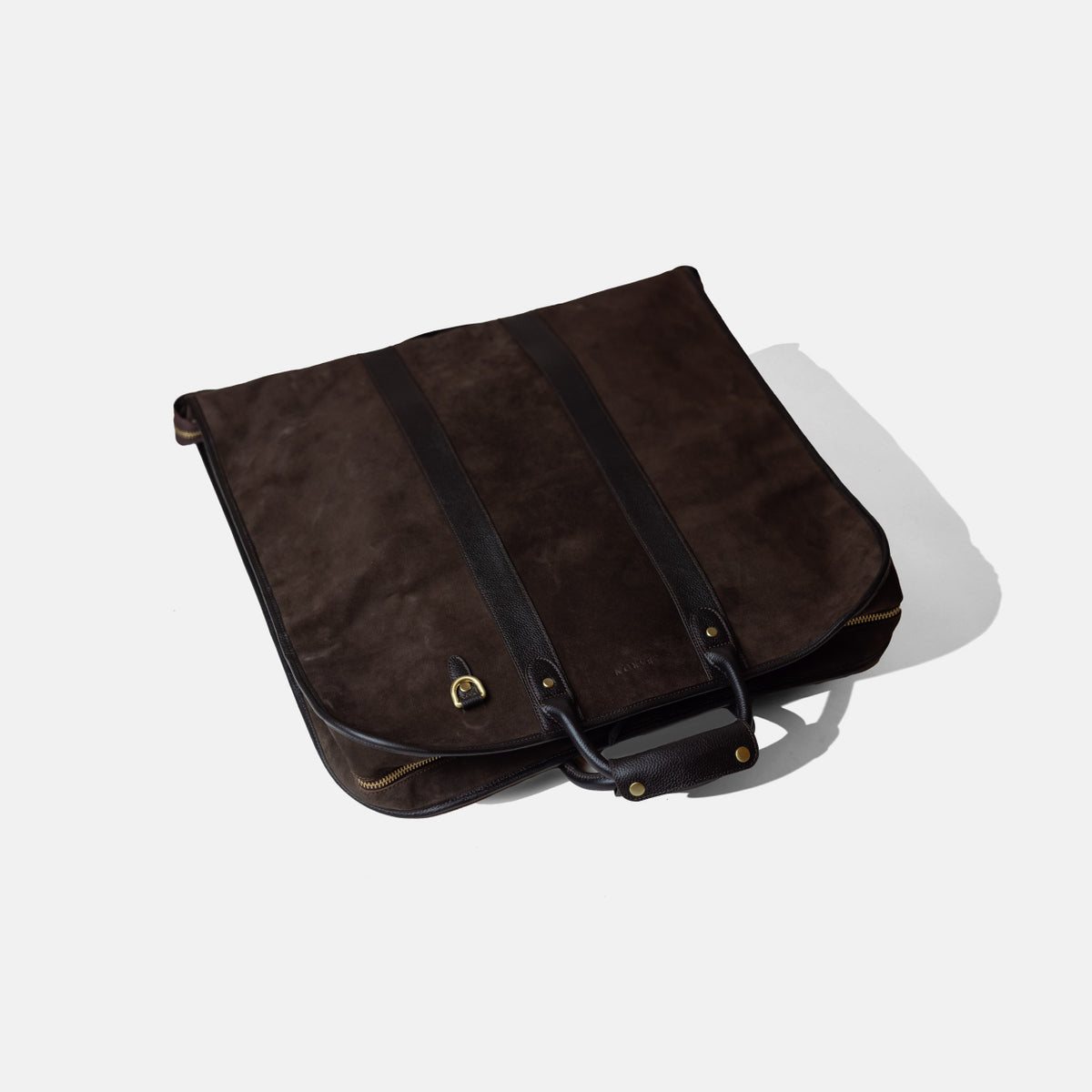 
                  
                    Garment Bag in Brown Suede
                  
                