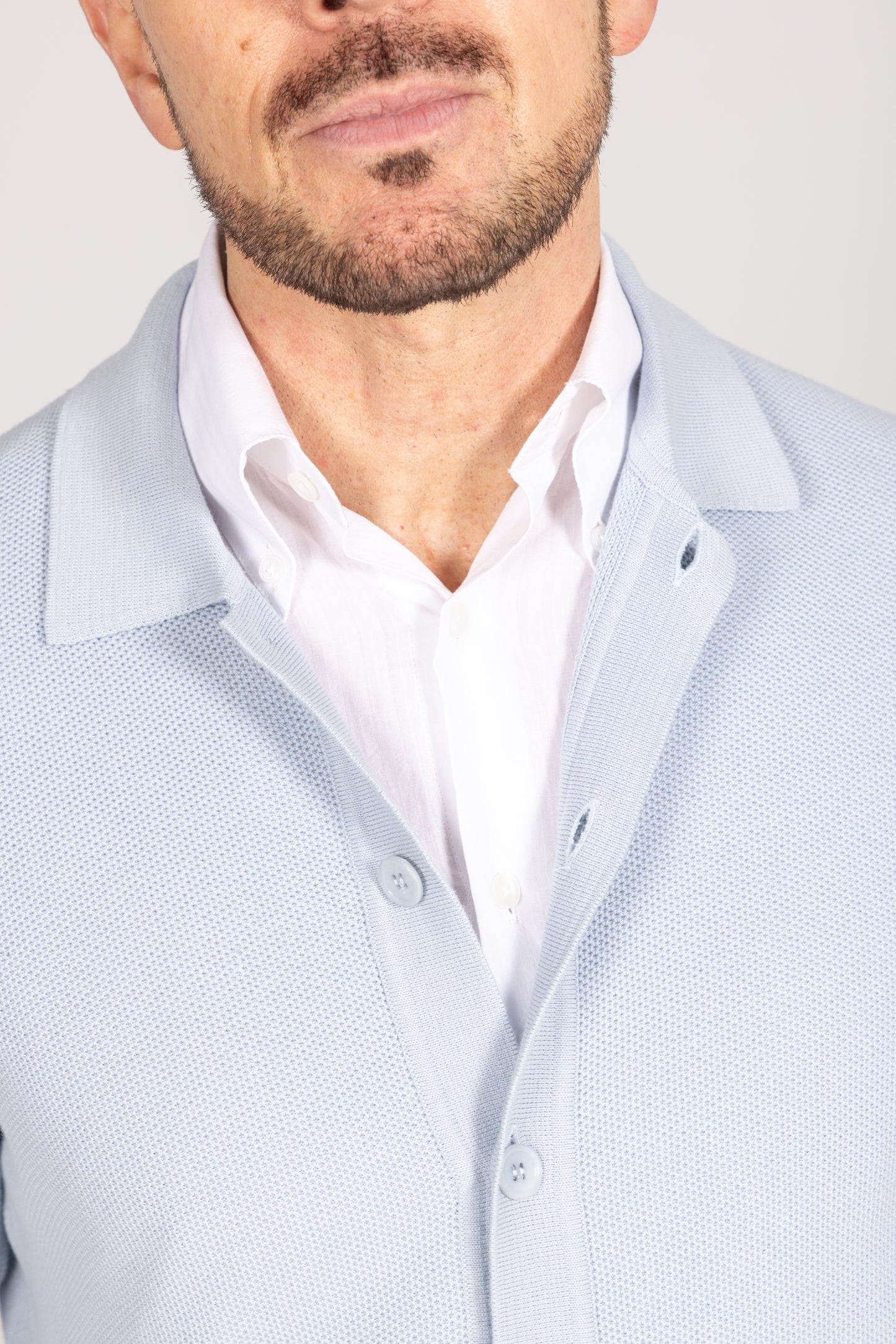 
                  
                    Polo Collar Cardigan in Sky Blue Piquet
                  
                