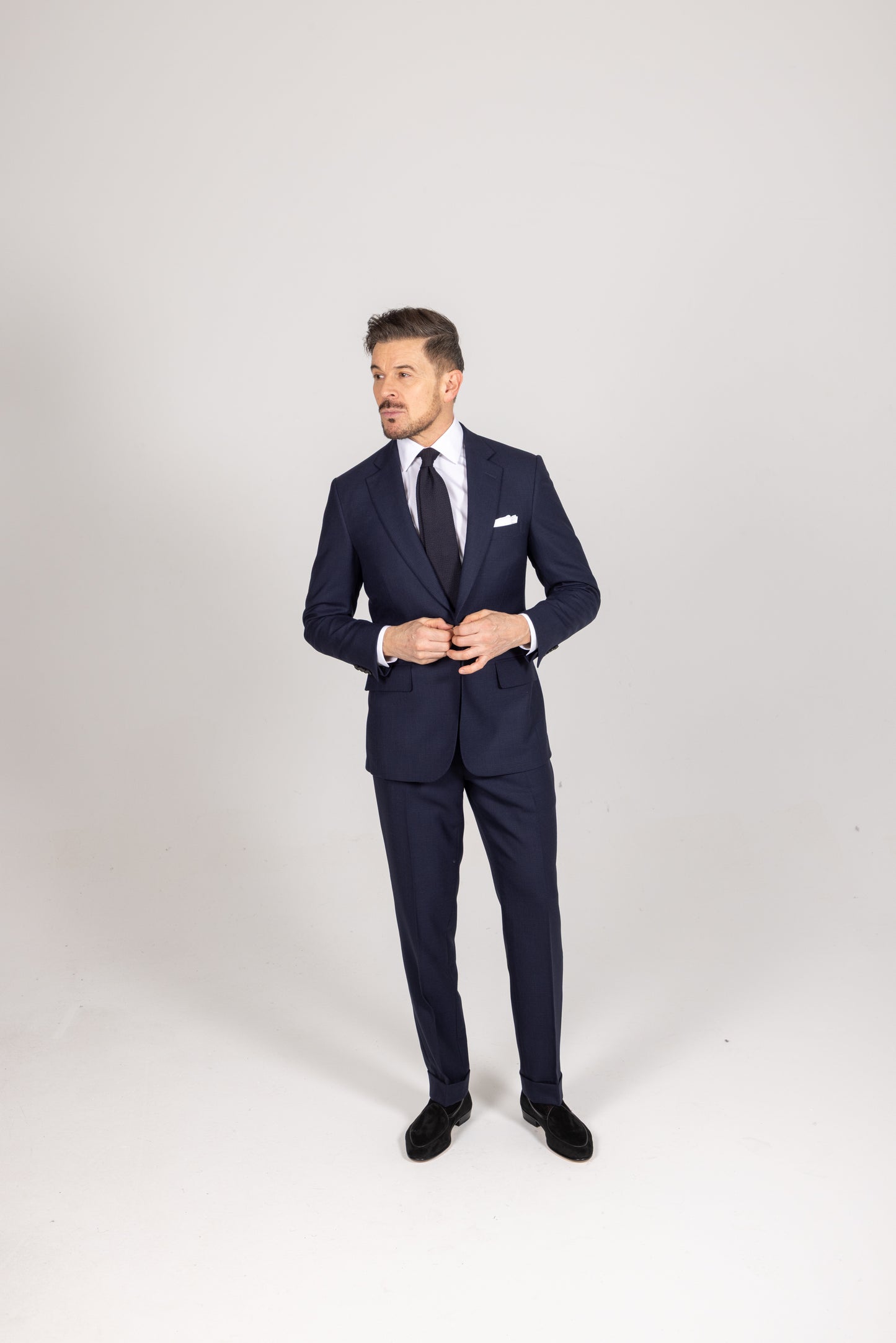 
                  
                    Single Breasted Notch Suit in Navy Glen Check Wool
                  
                