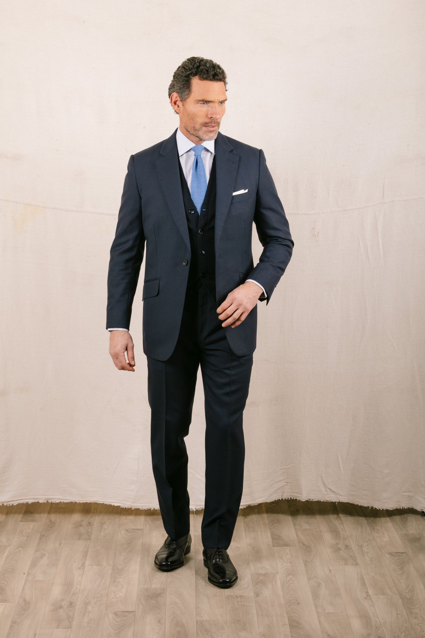 
                  
                    Single Breasted Notch Lapel Suit in Mid Blue Plain Weave
                  
                