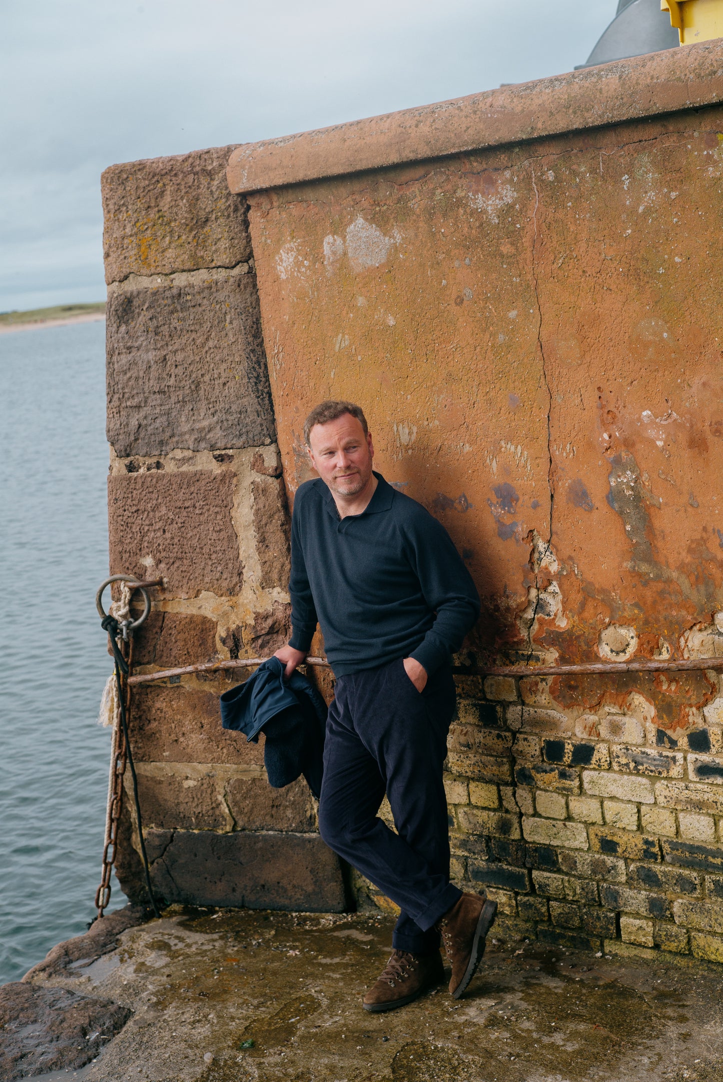 
                  
                    Polo Neck Jumper in Midnight
                  
                