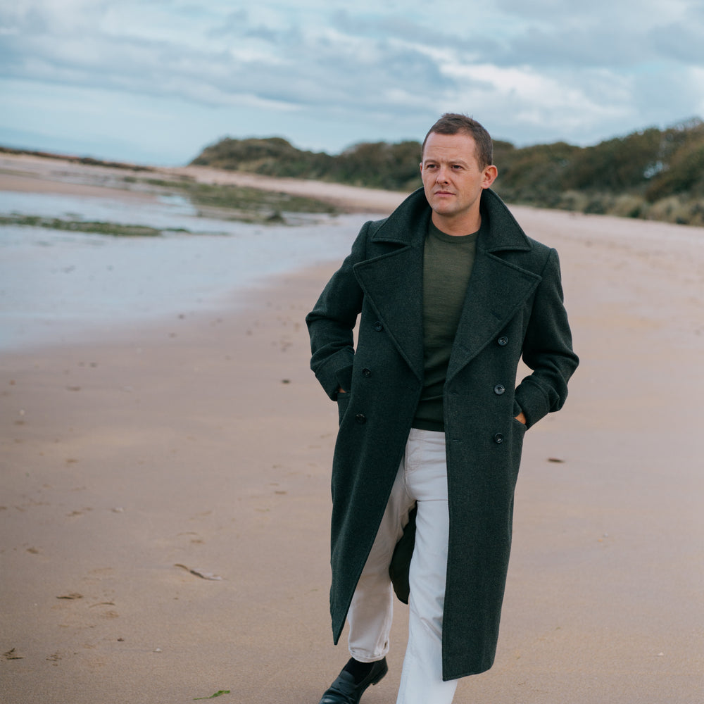 
                  
                    Knitted T-Shirt in Moss Merino Wool
                  
                