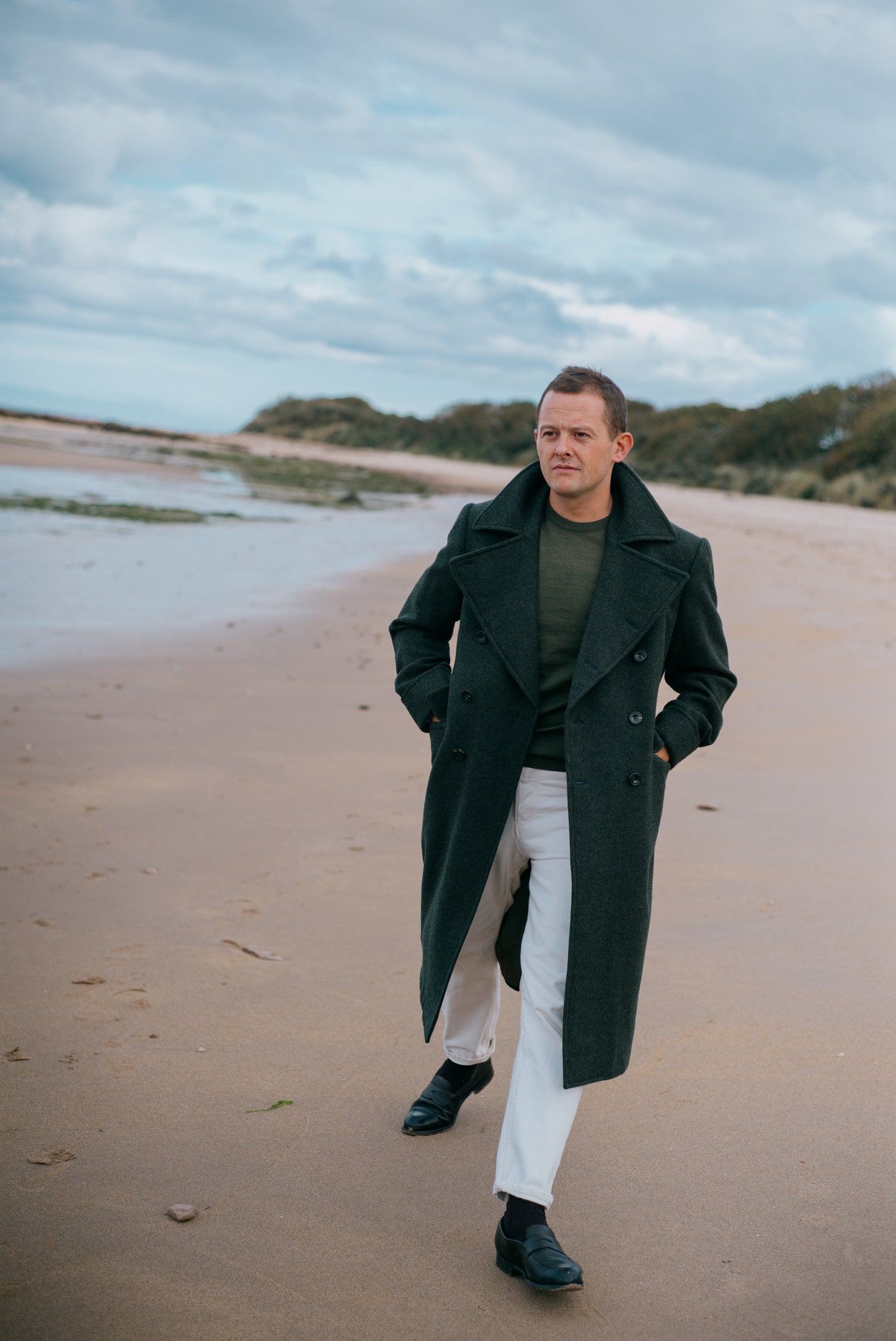 
                  
                    Knitted T-Shirt in Moss Merino Wool
                  
                