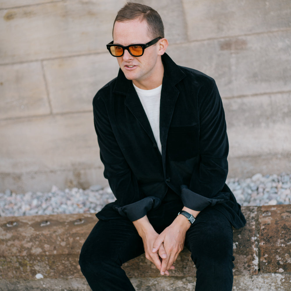 
                  
                    Flat Front Trouser in Black Cashmere Mix Corduroy
                  
                