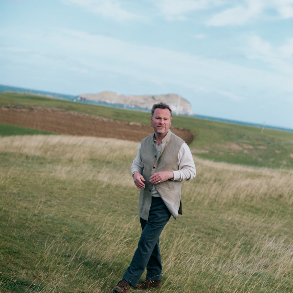 
                  
                    Polo Neck Jumper in Cedar
                  
                