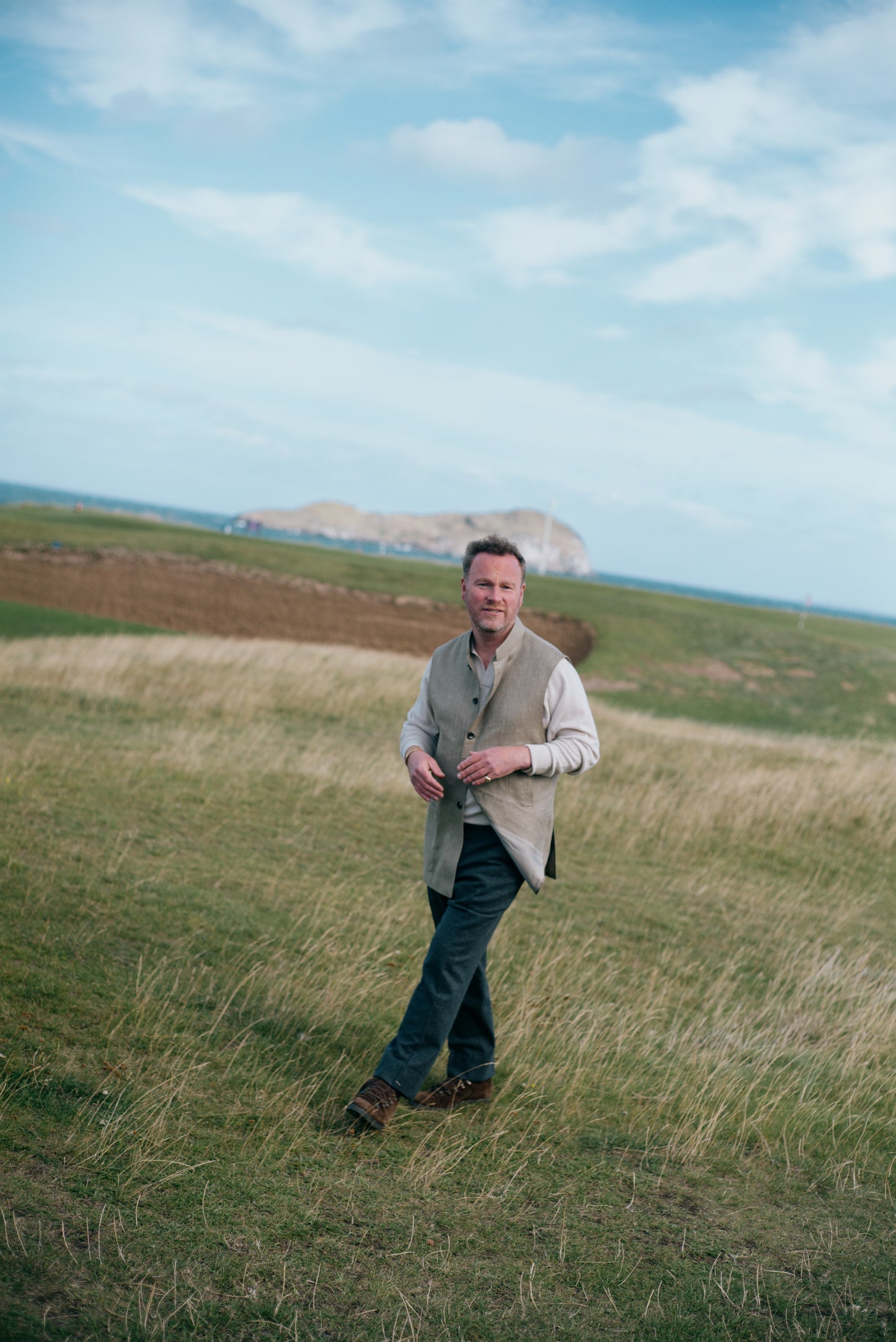 
                  
                    Polo Neck Jumper in Cedar
                  
                