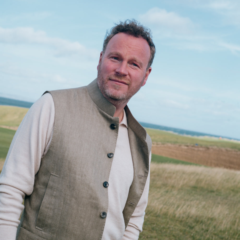 
                  
                    Polo Neck Jumper in Cedar
                  
                