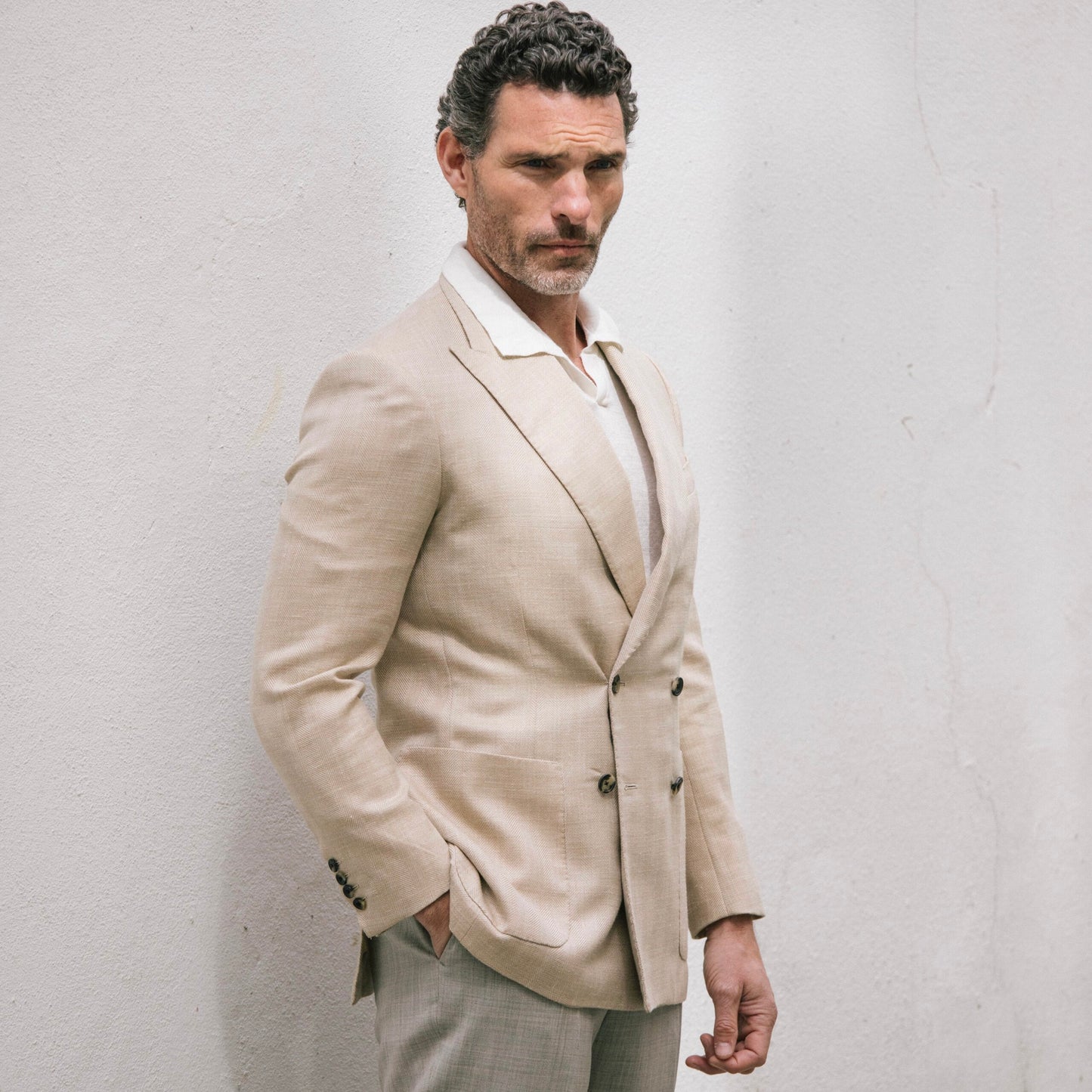 
                  
                    Peak Lapel Double Breasted Jacket in Cream Wool, Silk & Linen Herringbone
                  
                