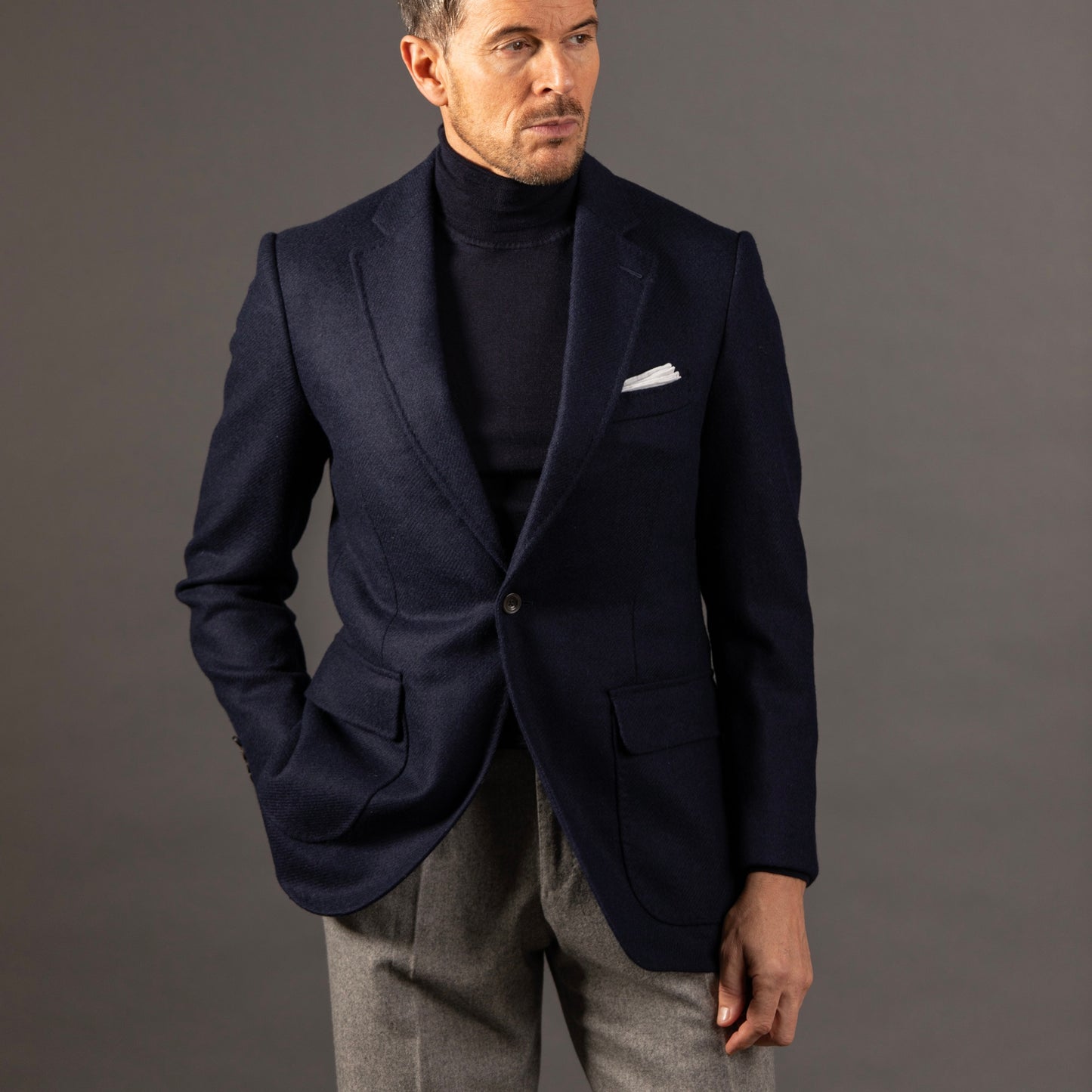 
                  
                    Roll Neck Jumper in Navy Cashmere Silk
                  
                