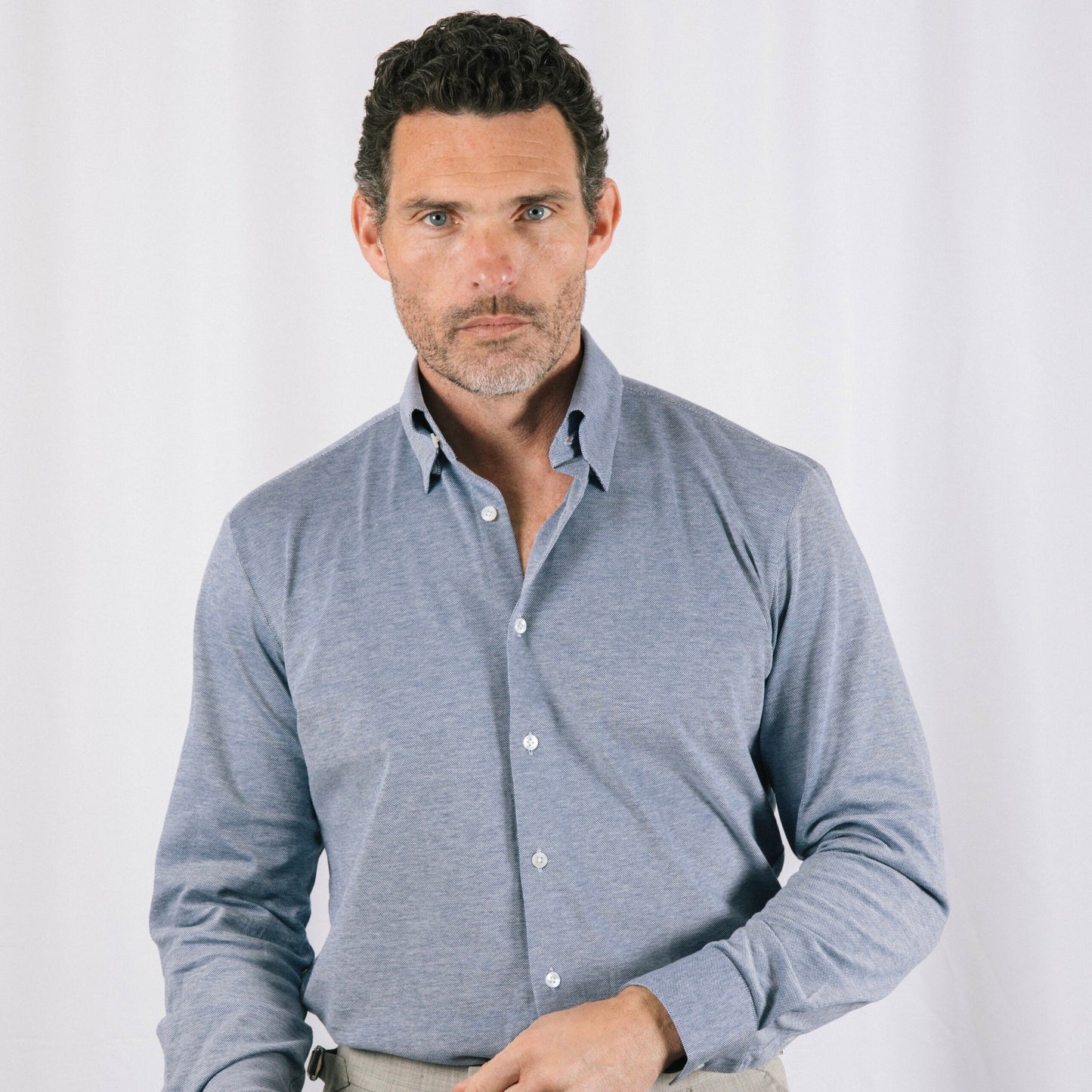 
                  
                    Hidden Button Down Shirt in Mid Blue Piqué Cotton
                  
                