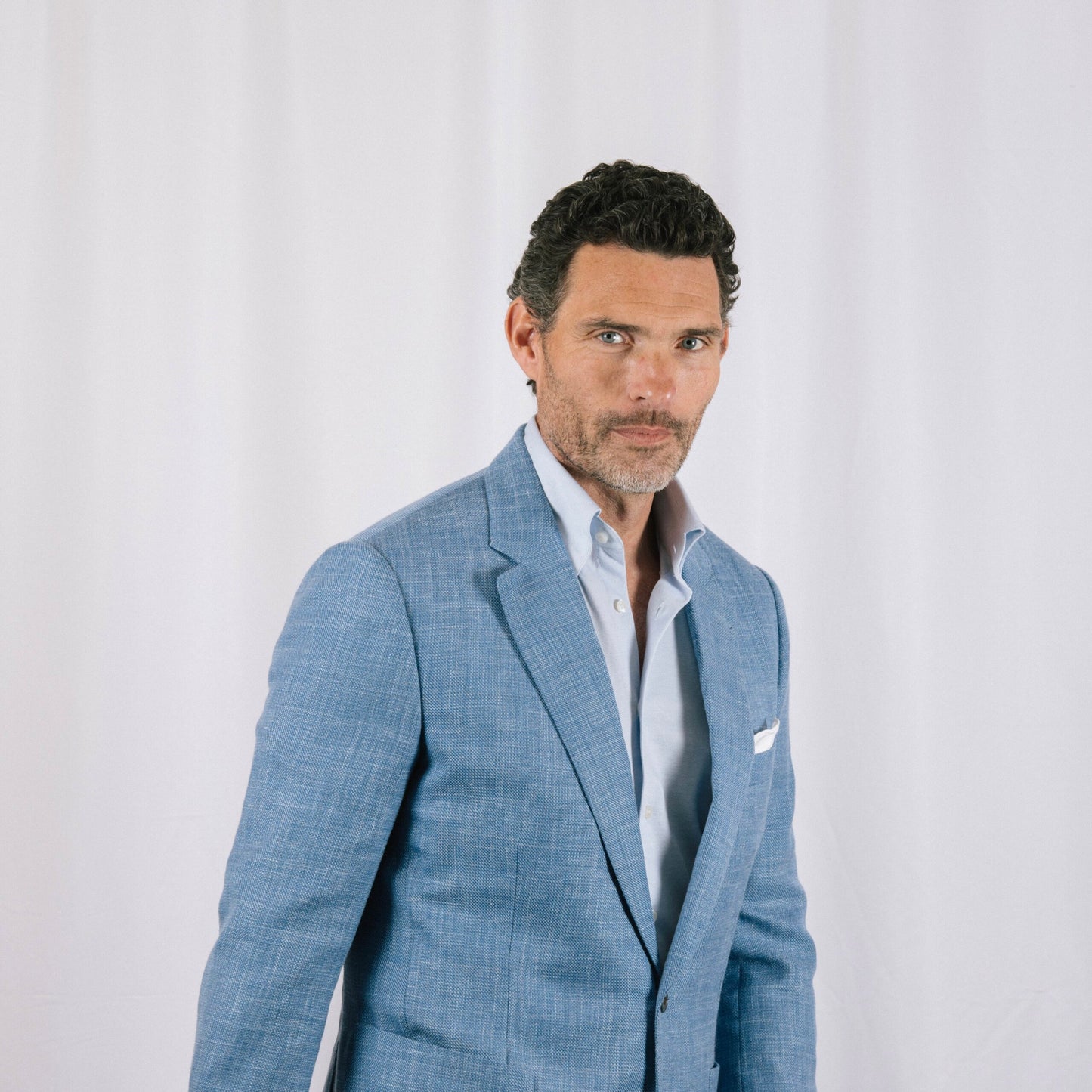 
                  
                    Hidden Button Down Shirt in Sky Blue Piqué Cotton
                  
                