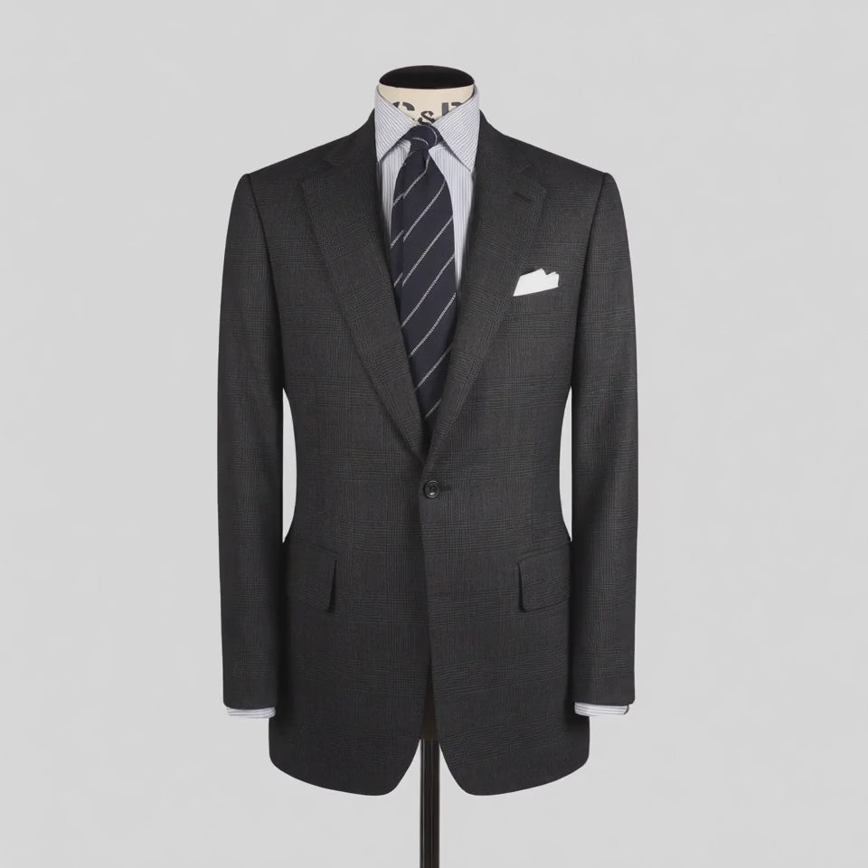 
                  
                    Load and play video in Gallery viewer, Single Breasted Notch Suit in Charcoal Check Wool
                  
                